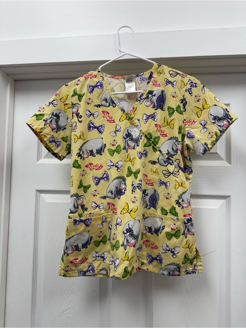 Disney XS Yellow Eeyore & Bow Print Scrub Top